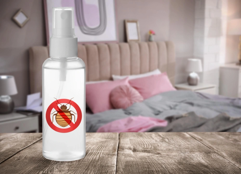 Anti bed bug spray on wooden table in bedroom